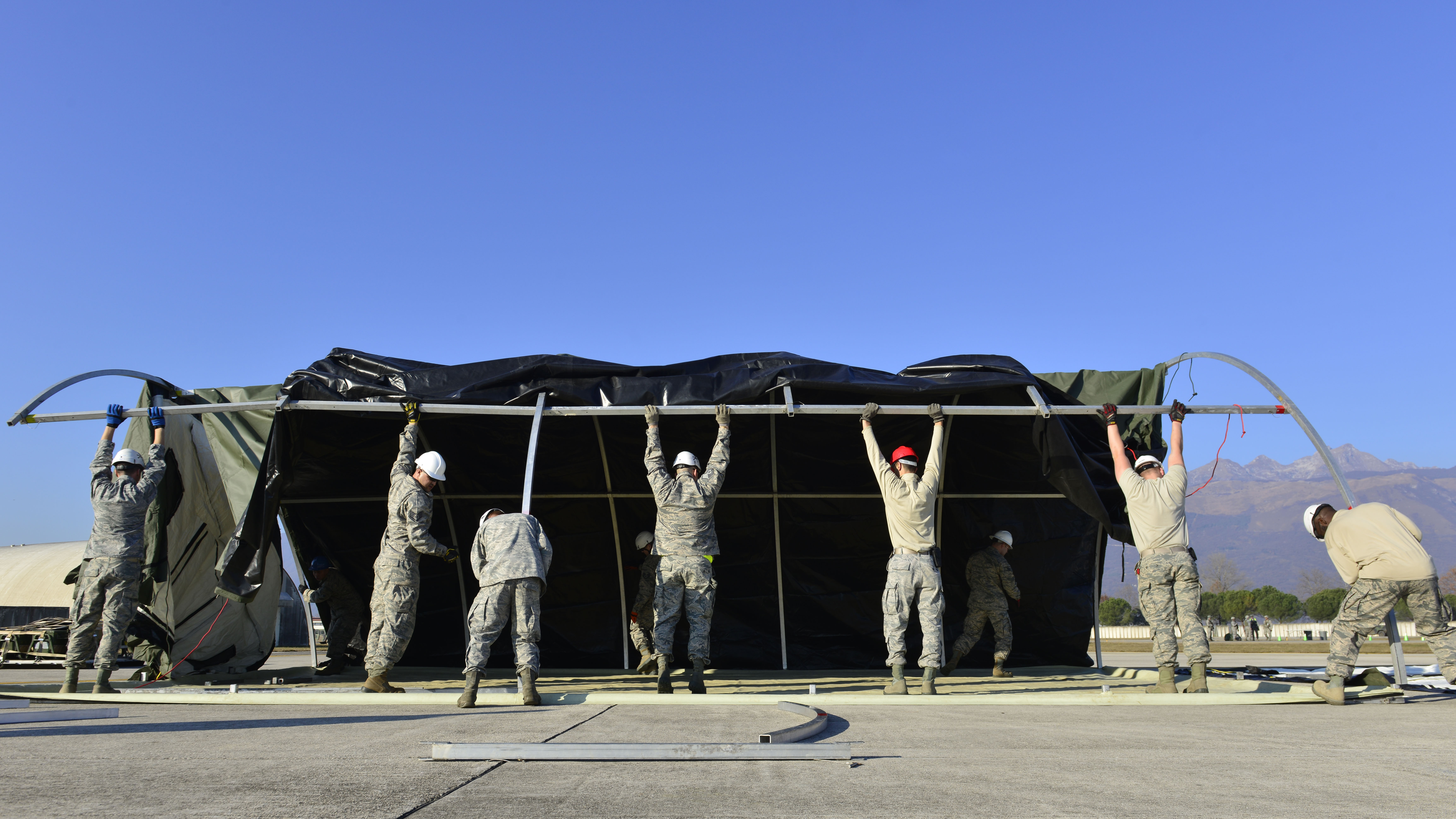 Airmen building a shelter